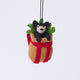 Handmade felt Adirondack Basket with Black Bear Cub ornament from Craftspring, featuring a rustic basket filled with holly and an adorable black bear cub peeking out—heirloom-quality Christmas decor, ethically crafted by artisans using sustainable wool.