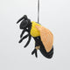 Fair trade felt bumblebee ornament with beaded thorax and pollen clusters, made in Kyrgyzstan