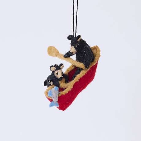 Handmade felt Bears in a Canoe ornament from Craftspring, featuring a mama bear paddling a canoe with a cub climbing over the side—heirloom-quality Christmas decor, ethically crafted by artisans using sustainable wool.