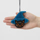 A double-sided handmade Black Cat Beaded Ornament featuring an intricately embroidered cat in a sparkling blue witch hat, with a playful “Boo” on the reverse.