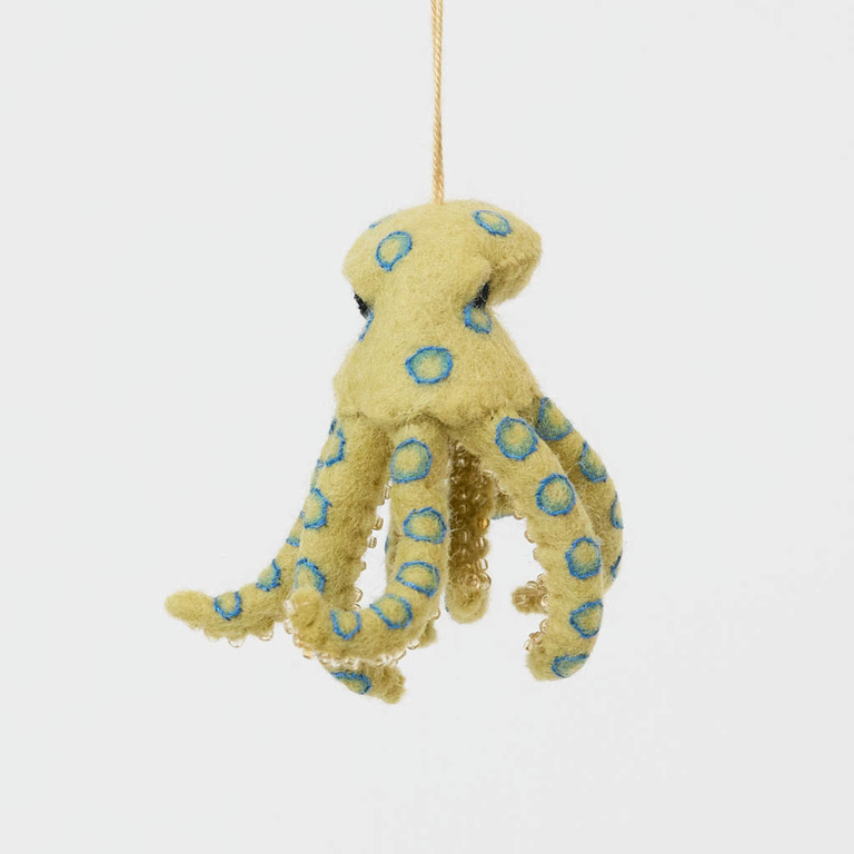 A handcrafted felt Blue-ringed Octopus Ornament inspired by one of Australia's most fascinating and recognizable marine creatures.