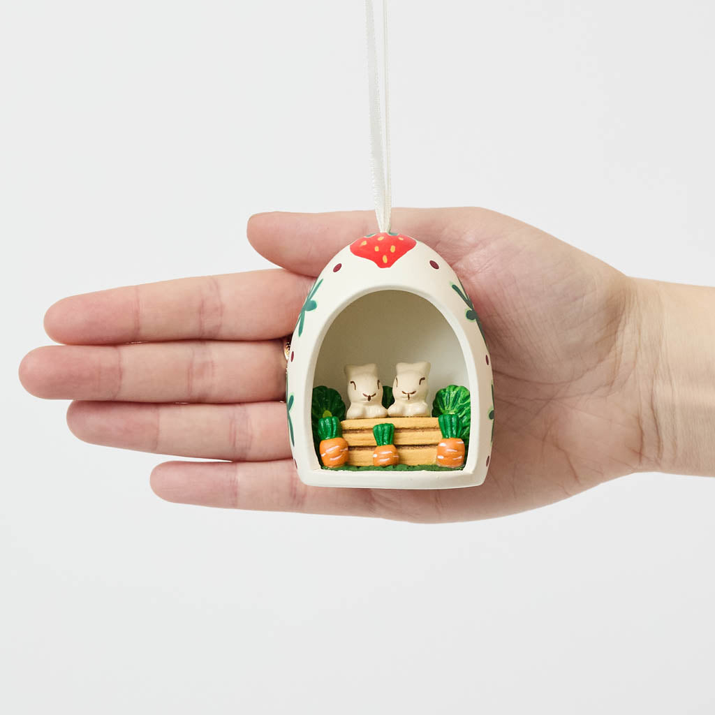 Bunnies in Egg Ceramic Ornament