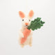 Needle-felted bunny ornament with orange carrot, made from soft wool for spring or holiday trees