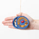 Bring back cherished holiday memories and taste the joy of the season with our felted Butter Cookies Tin Ornament, with beaded and embroidered details galore!