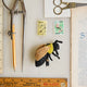 Beaded bumblebee felt ornament celebrating pollination and ecosystem balance