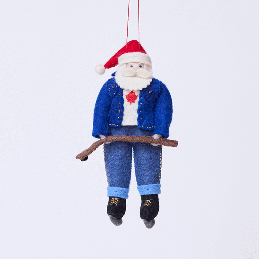 Craftspring’s Canadian Santa Ornament rotating to show front, side, and back views — felt Santa dressed in a denim jacket and jeans with ice skates, holding a hockey stick, and featuring a Canadian flag maple leaf, a playful ornament perfect for holiday gifting — heirloom-quality Christmas decor, ethically crafted by artisans using sustainable wool.