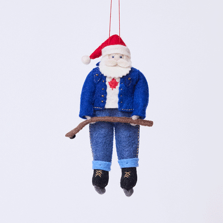 Craftspring’s Canadian Santa Ornament rotating to show front, side, and back views — felt Santa dressed in a denim jacket and jeans with ice skates, holding a hockey stick, and featuring a Canadian flag maple leaf, a playful ornament perfect for holiday gifting — heirloom-quality Christmas decor, ethically crafted by artisans using sustainable wool.