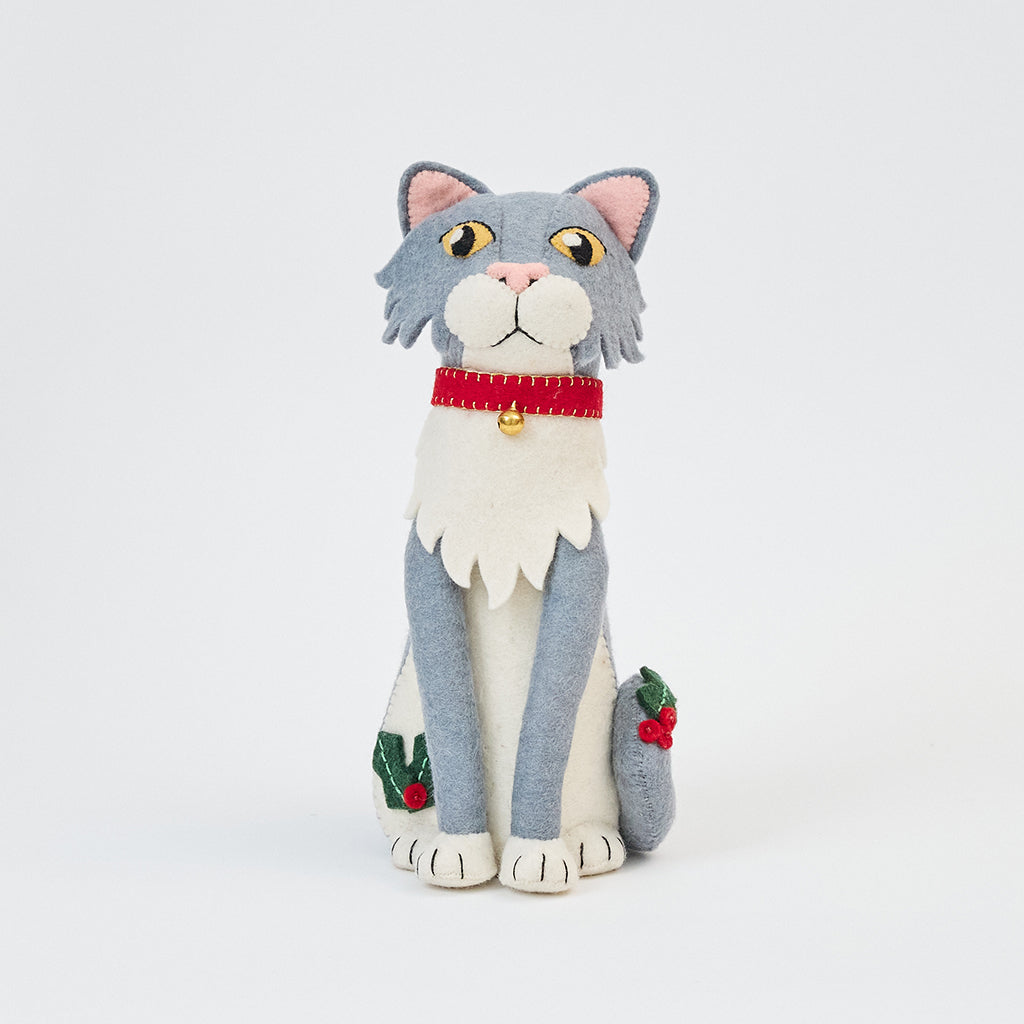 Handmade felt Gray Cat Tree Topper from Craftspring, featuring a red collar with a bell and festive holly—purr-fect for cat lovers and guaranteed to steal the show at Christmas, this whimsical holiday gift is ethically crafted by artisans using sustainable wool.