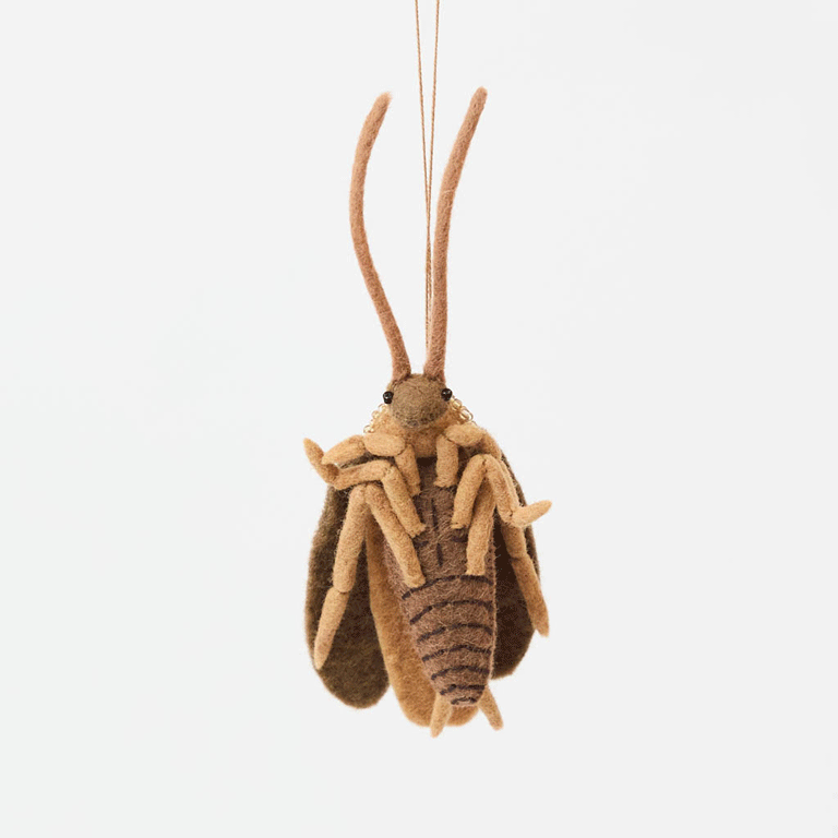 Celebrate one of nature’s most resilient and fascinating creatures with our Cockroach Ornament. 