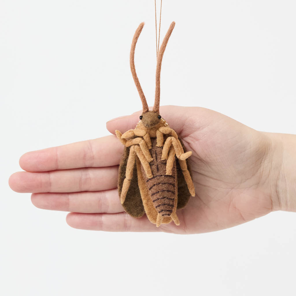 Celebrate one of nature’s most resilient and fascinating creatures with our Cockroach Ornament. 