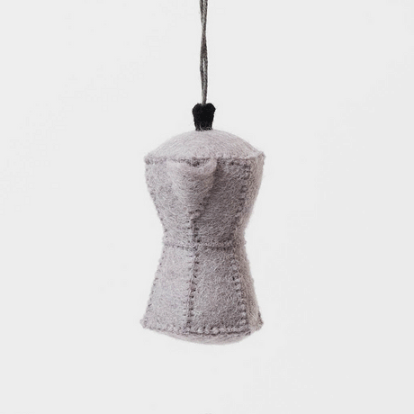 Handcrafted from natural wool felt, this charming ornament is inspired by the classic stovetop camping percolator—a beloved companion for generations of campers, hikers, RV travelers, and cabin lovers. Its timeless silhouette, soft neutral tones, and handcrafted stitching evoke memories of peaceful mornings surrounded by towering pines, fresh mountain air, and the sounds of nature waking up.