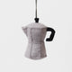 Handcrafted from natural wool felt, this charming ornament is inspired by the classic stovetop camping percolator—a beloved companion for generations of campers, hikers, RV travelers, and cabin lovers. Its timeless silhouette, soft neutral tones, and handcrafted stitching evoke memories of peaceful mornings surrounded by towering pines, fresh mountain air, and the sounds of nature waking up.