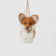 Bring a little wagging joy to your holiday decor with our irresistibly cute Felted Alpaca Corgi Ornament. Lovingly handmade by skilled artisans, this cheerful pup features the corgi’s signature golden coat, perky ears, and—of course—its famously adorable heart-shaped butt.