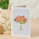 Illustrated Ranunculus greeting card on textured white paper, blank inside with snail detail—perfect for thank you notes, birthdays, or just because.

