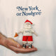 Celebrate Christmas in the Big Apple with our handmade NYC Santa Ornament, featuring Santa dressed like a true New Yorker with an NYC tee and a classic slice of New York pizza.

Who says Santa only runs on milk and cookies? After a busy night delivering gifts across the five boroughs, he's treating himself to a well-earned slice of New York pizza.
