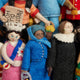 Young Queen Elizabeth II (surrounded by other iconic women) felt ornament in gala attire with a loyal corgi at her side. Handmade wool Christmas ornament honoring British royalty. Fair trade and ready to hang.