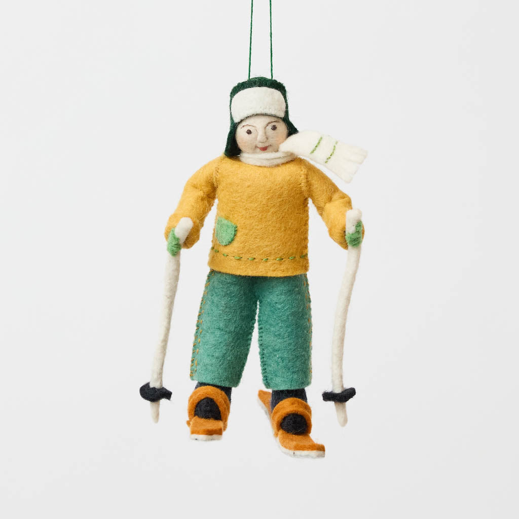  Take the Scenic Route!

There's nothing quite like the peaceful magic of a snow-covered trail! Our Cross-Country Skier Ornament celebrates the simple joys of winter adventures, from gliding through frosty forests to breathing in the crisp mountain air. 