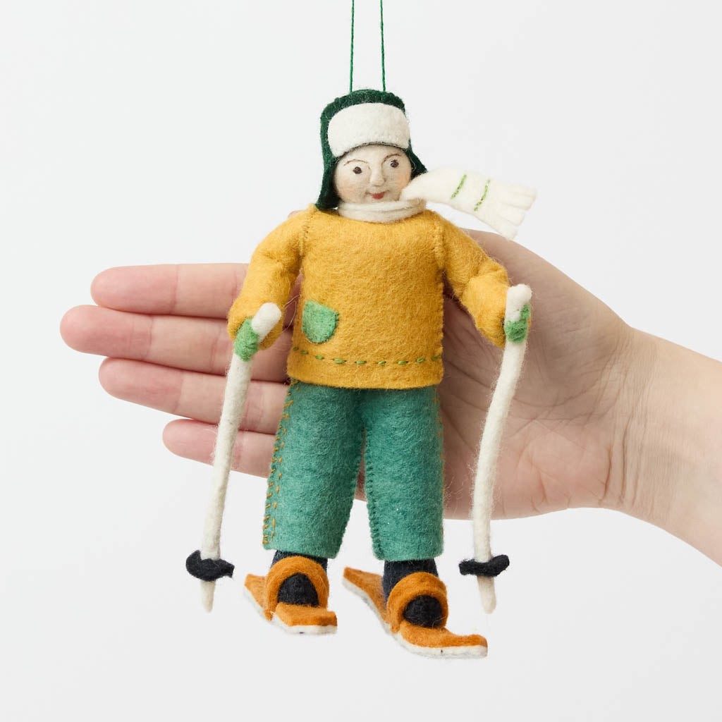 Take the Scenic Route!

There's nothing quite like the peaceful magic of a snow-covered trail! Our Cross-Country Skier Ornament celebrates the simple joys of winter adventures, from gliding through frosty forests to breathing in the crisp mountain air. 