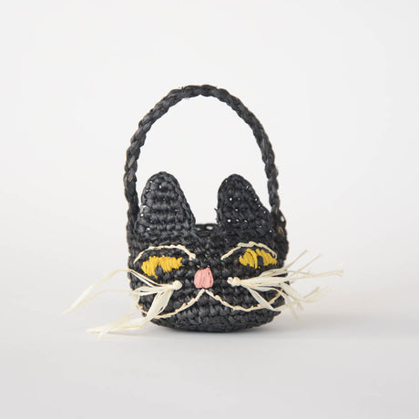 Adorably hand-crocheted, this black cat is ready for autumnal nights! Soft, lightweight, and ethically made, our mini raffia basket is perfectly sized for a little touch of joy. Fill it with treats and treasures for your fall table.&nbsp;