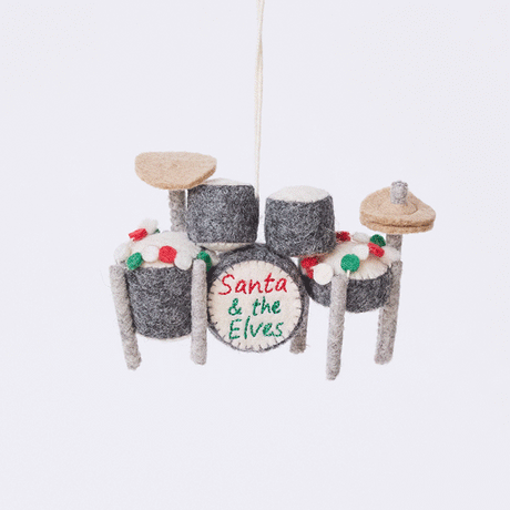 Handmade felt Christmas Drum Set Ornament from Craftspring rotating to show intricate felt details — embroidered “Santa and the Elves” band name and garland draped across the top — heirloom-quality holiday decor, ethically crafted by artisans using sustainable wool.