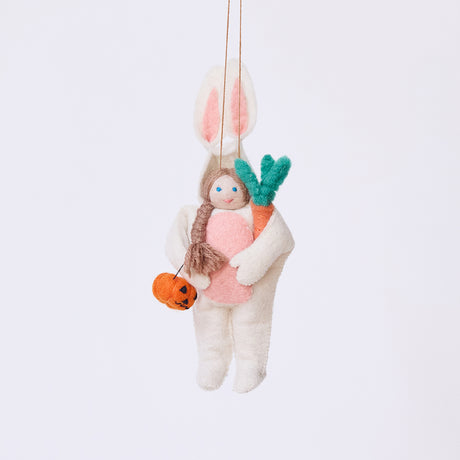 Handmade felt Easter Bunny Trick-Or-Treater ornament from Craftspring, featuring a girl in an Easter Bunny costume holding a pumpkin basket—heirloom-quality Halloween decor, ethically crafted by artisans using sustainable wool.