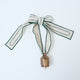 Embossed Bell with Green Ribbon