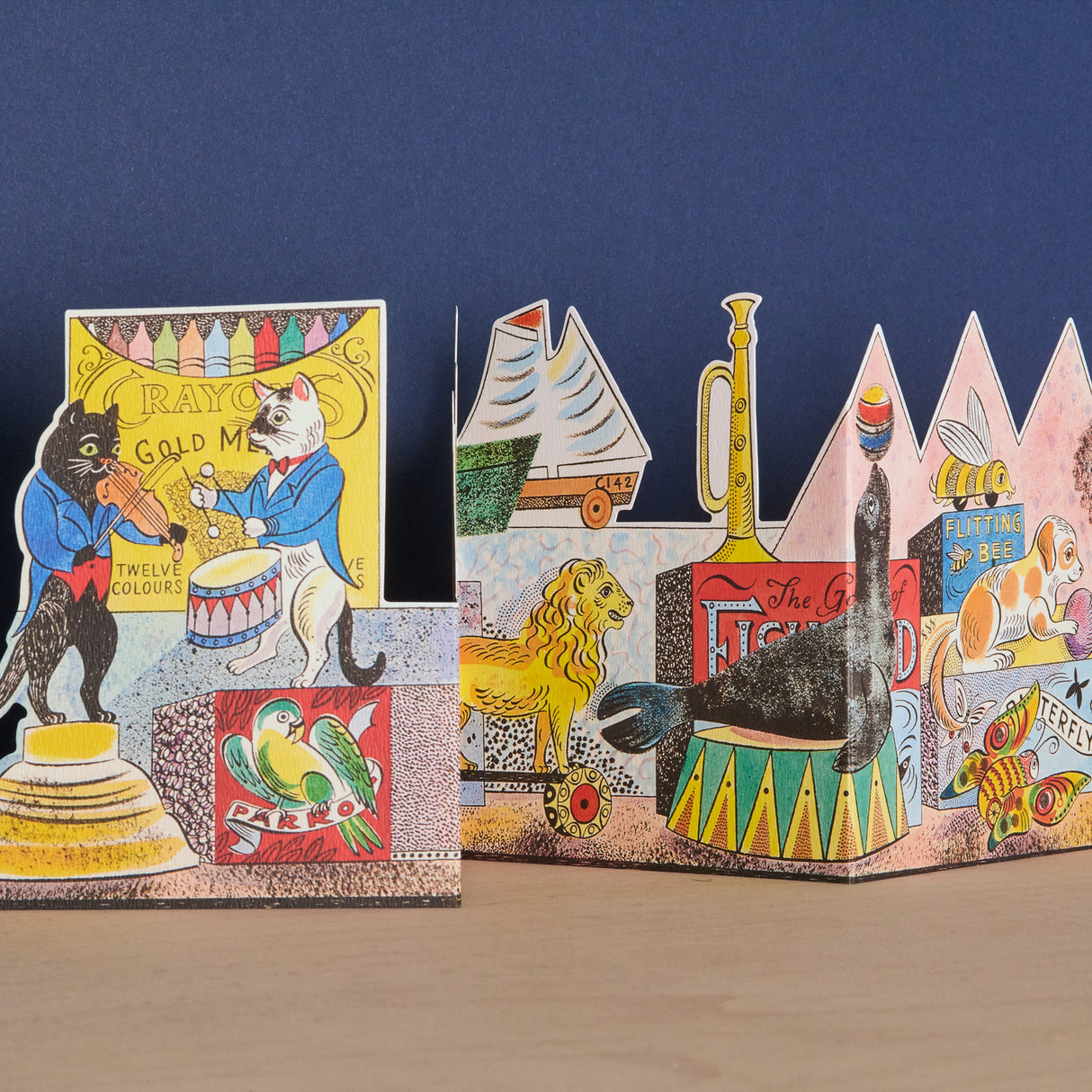 Illustrated by Emily Sutton, England-based artist, Victorian-inspired tin toy animal motif, Die-cut concertina (accordion fold) design