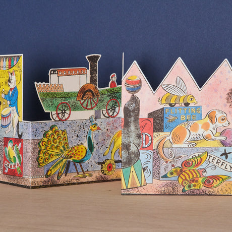 Illustrated by Emily Sutton, England-based artist, Victorian-inspired tin toy animal motif, Die-cut concertina (accordion fold) design