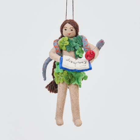 Handmade felt Eve ornament from Craftspring, featuring Eve holding a book of knowledge and an apple, wrapped in leaves with a serpent around her shoulders—heirloom-quality Christmas decor, ethically crafted by artisans using sustainable wool.