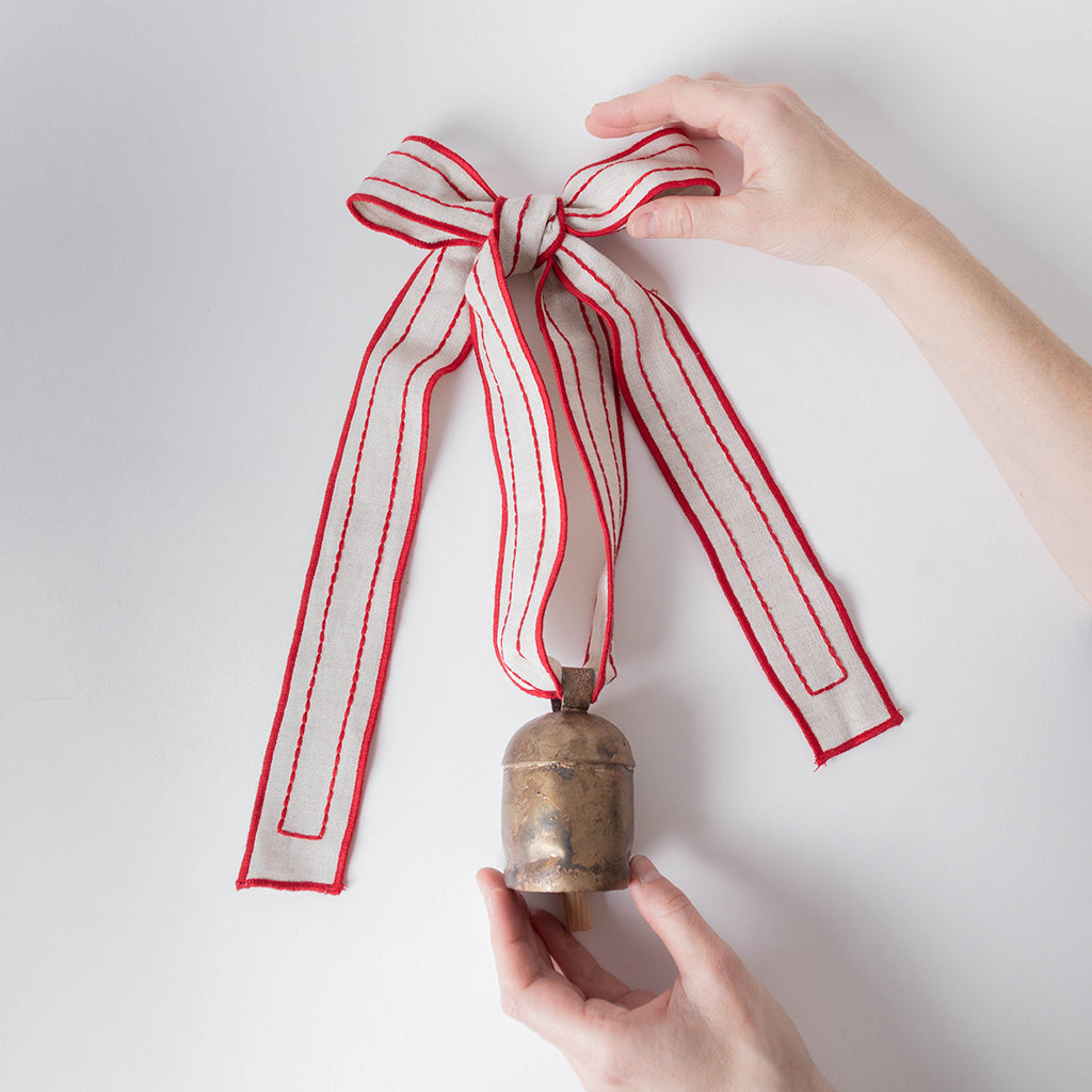 Festive Metal Bell with Hand-Embroidered Ribbon