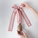 Festive Metal Bell with Embroidered Ribbon