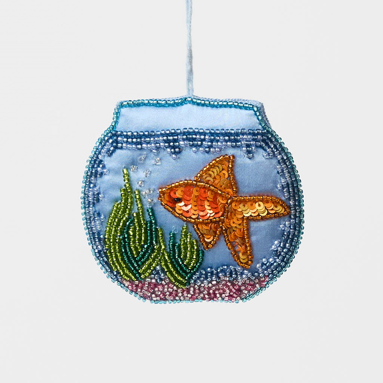 Make a splash with our whimsical Fishbowl Beaded Ornament! 🐠✨ This beautifully handcrafted ornament captures the charm of a beloved goldfish swimming peacefully through its miniature underwater world. Featuring a shimmering sequined goldfish, vibrant hand-beaded aquatic plants, and a sparkling fishbowl outlined with delicate glass beads, every detail is carefully stitched by hand to create a dazzling keepsake.