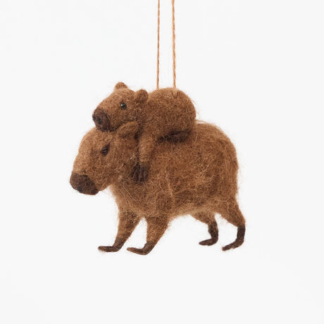 A needle-felted alpaca wool capybara and baby ornament from Peru, symbolizing calm, nurturing love, and gentle family bonds—perfect for meaningful gifting and cozy decor.
