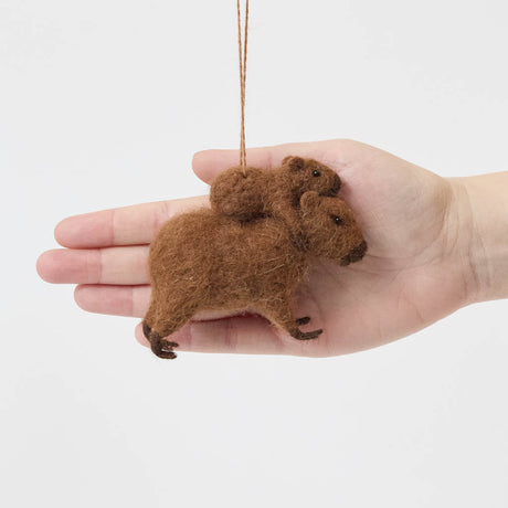 A needle-felted alpaca wool capybara and baby ornament from Peru, symbolizing calm, nurturing love, and gentle family bonds—perfect for meaningful gifting and cozy decor.