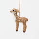 An irresistibly sweet, needle-felted alpaca wool fawn ornament from Peru, featuring delicate white spots, soft fuzzy textures, and lifelike details—bringing the gentle magic of woodland creatures to your Christmas tree.