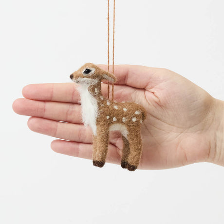 An irresistibly sweet, needle-felted alpaca wool fawn ornament from Peru, featuring delicate white spots, soft fuzzy textures, and lifelike details—bringing the gentle magic of woodland creatures to your Christmas tree.