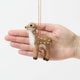 An irresistibly sweet, needle-felted alpaca wool fawn ornament from Peru, featuring delicate white spots, soft fuzzy textures, and lifelike details—bringing the gentle magic of woodland creatures to your Christmas tree.