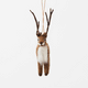Soft, fuzzy, and full of woodland wonder, our Fuzzy Reindeer Ornament captures the quiet magic of the holiday season. With its beautiful tall antlers, sweet expression, and irresistibly fluffy coat, this darling little reindeer looks as though it has wandered straight out of an enchanted winter forest.