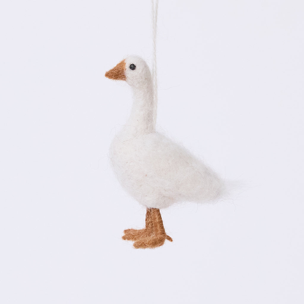 Craftspring’s Goose Ornament — needle felted with fluffy feathers and beaded eyes, this handmade felt goose brings timeless holiday charm — heirloom-quality Christmas ornament, ethically crafted by artisans using sustainable wool.
