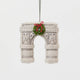  Our Grand Arch Ornament captures that timeless landmark, beautifully adorned with a festive holiday wreath for an extra touch of seasonal cheer.

Carefully handcrafted with embroidered architectural details, sculptural felt columns, delicate bead accents, and a miniature wreath tied with a bright red bow, this ornament celebrates both the elegance of the famous arch and the magic of Christmas in New York. 