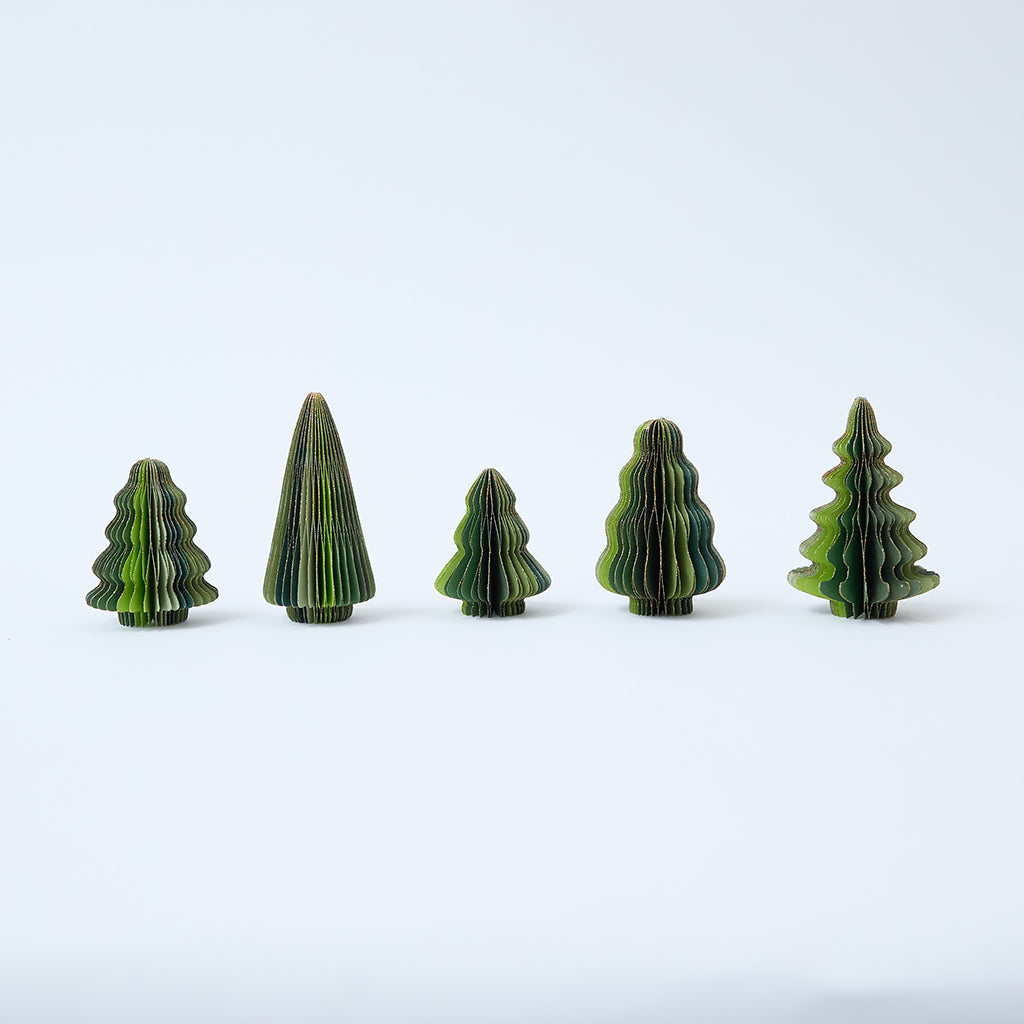 Craftspring’s Green Honeycomb Paper Mini Trees — Set of 5, standing upright with several shades of green and gold sparkle on the edges, each tree a different shape — handmade by artisans from recycled cotton waste, perfect for mantles or Christmas scenes.