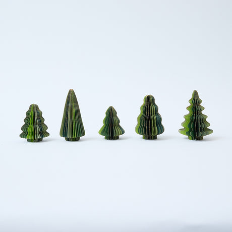 Craftspring’s Green Honeycomb Paper Mini Trees — Set of 5, standing upright with several shades of green and gold sparkle on the edges, each tree a different shape — handmade by artisans from recycled cotton waste, perfect for mantles or Christmas scenes.