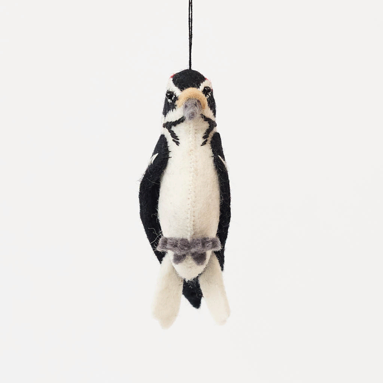 Celebrate the beauty and delicate details of woodland wildlife with this adorable handmade woodpecker ornament, a nature-inspired bird decoration perfect for nature lovers.