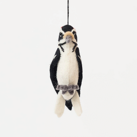Celebrate the beauty and delicate details of woodland wildlife with this adorable handmade woodpecker ornament, a nature-inspired bird decoration perfect for nature lovers.