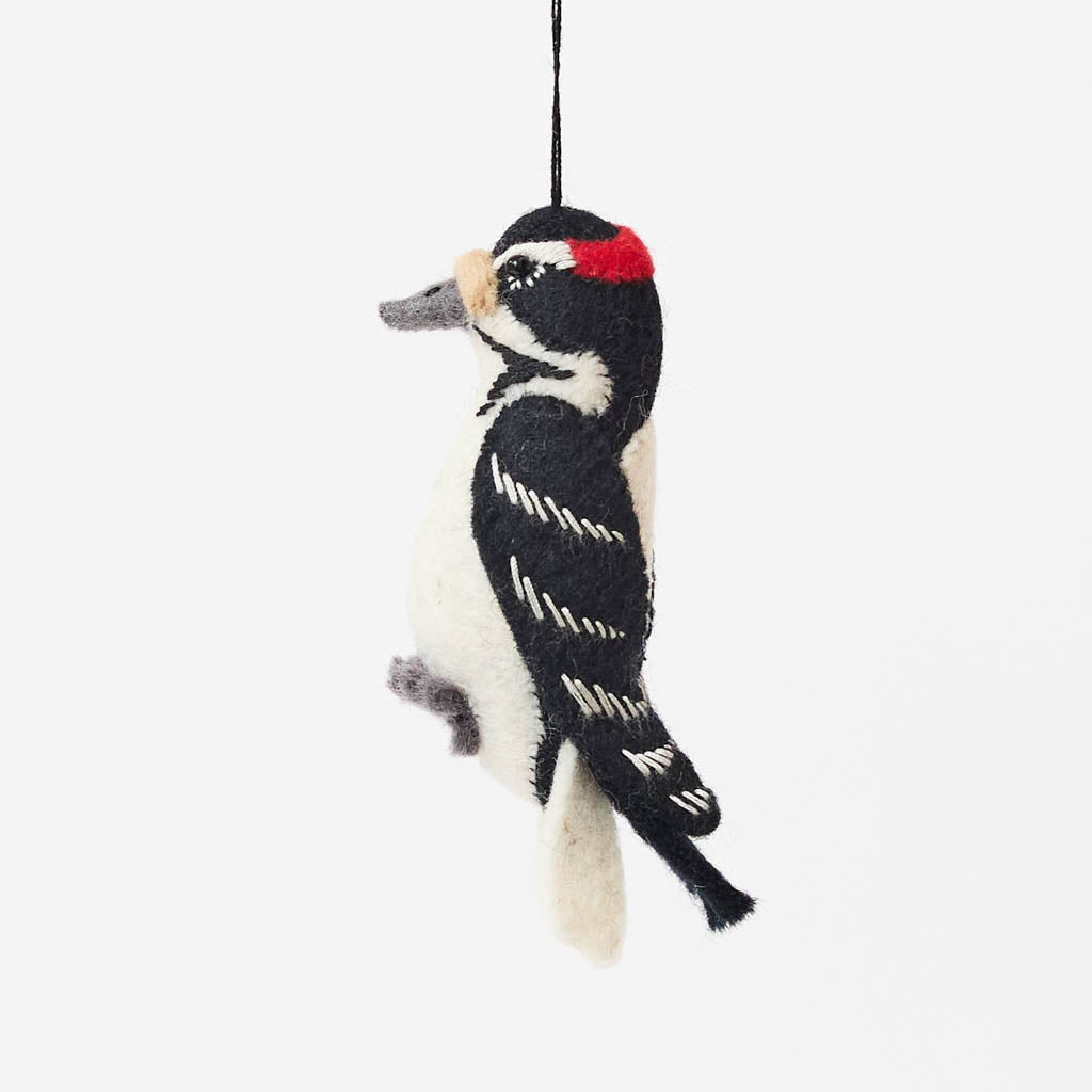 Celebrate the beauty and delicate details of woodland wildlife with this adorable handmade woodpecker ornament, a nature-inspired bird decoration perfect for nature lovers.