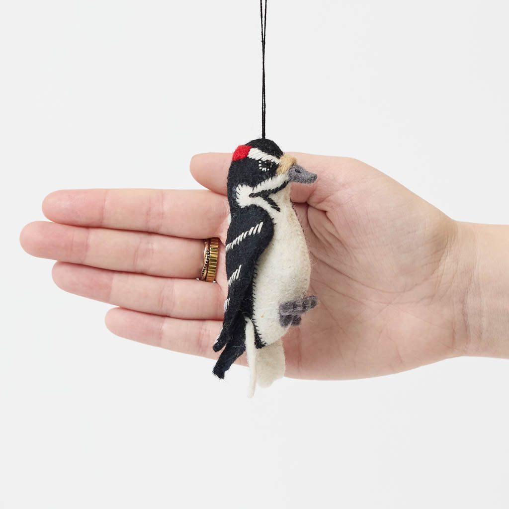 Celebrate the beauty and delicate details of woodland wildlife with this adorable handmade woodpecker ornament, a nature-inspired bird decoration perfect for nature lovers.
