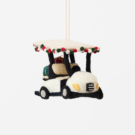 Our Holiday Golf Cart Ornament is ready to roll into the season with tropical flair! Decorated with a cheerful red, green, and white garland around the roof and carrying tiny wrapped presents in the back, this festive golf cart is the perfect ride for Christmas in paradise.