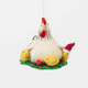 Gathered together on a festive green wreath our Holiday Hen with Chicks Ornament is a sweet celebration of family, nurturing, and holiday togetherness. A proud mother hen watches over her fluffy yellow chicks, while one festive little chick sports a tiny red Santa hat, adding an extra dash of Christmas cheer. 