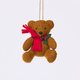 Craftspring’s Holiday Teddy Bear Ornament rotating to show front, side, and back views — felt vintage-style teddy bear wearing a red scarf with holly, a playful ornament perfect for holiday gifting — heirloom-quality Christmas decor, ethically crafted by artisans using sustainable wool.