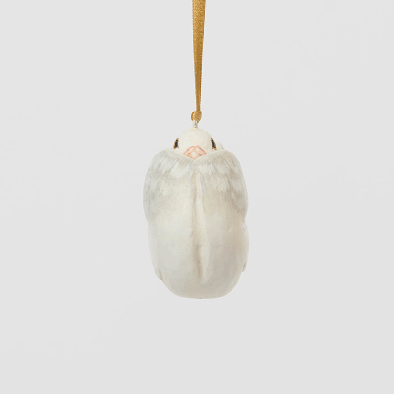 A handmade Holle Cropper Pigeon Ornament featuring a hand-painted resin bird with a distinctive puffed chest, creamy white plumage, and satin hanging ribbon.
